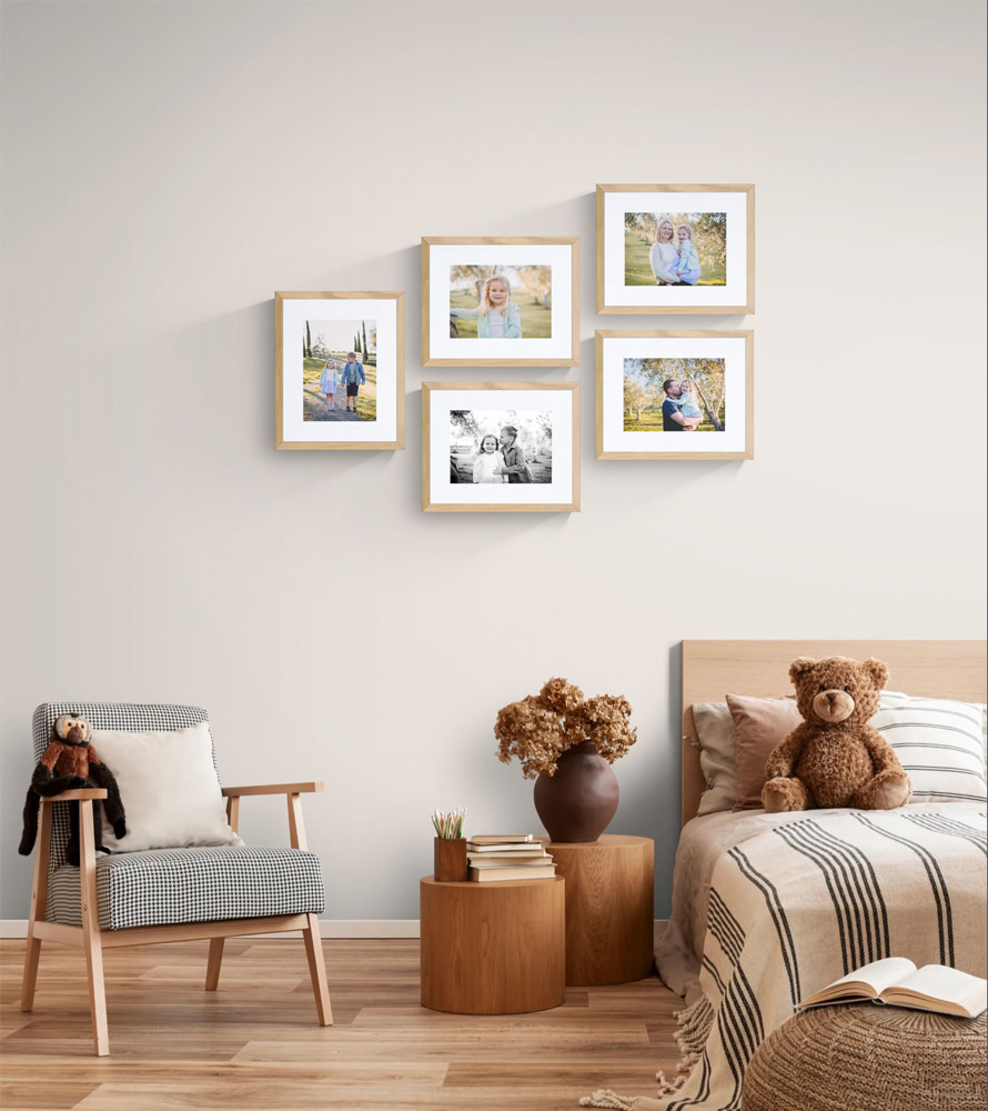 Display ideas for a girls bedroom of vacation photographs in Italy. Family Portraits on the wall above bed.