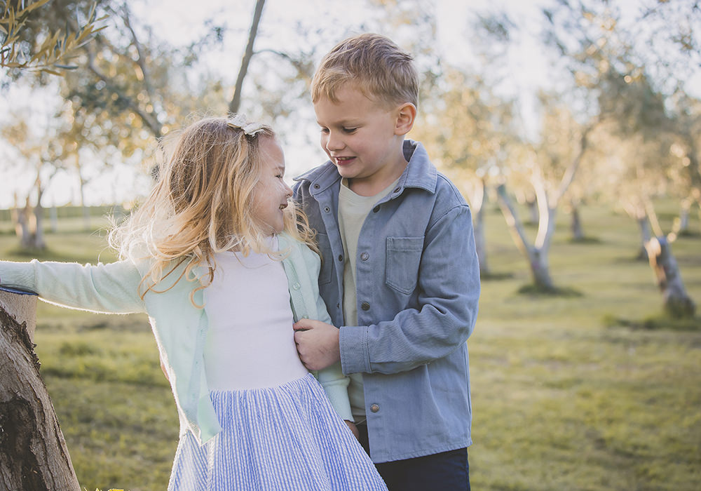 Family portraits Italy olive grove and cypress trees