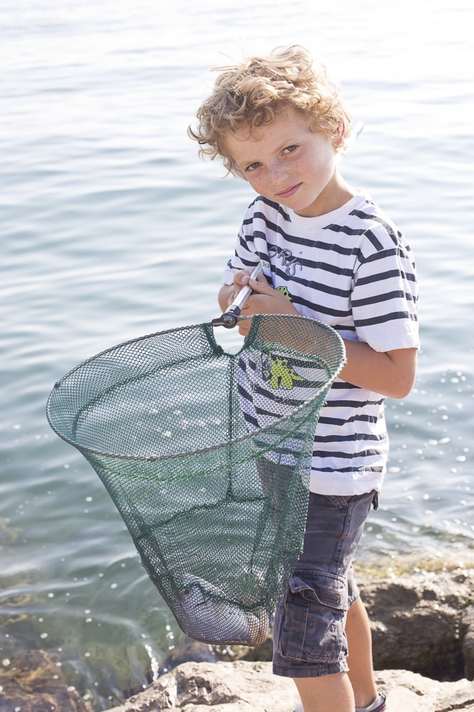 Things to do with children travelling in Italy...have fun fishing with just a net, then buy a fish to pretend you caught it!